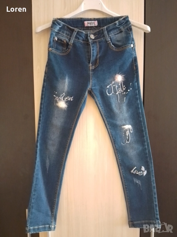 Ново!Детски дънки с пухчета по крачолите , снимка 1