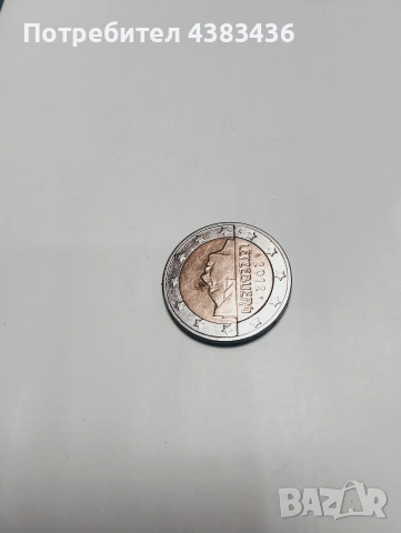 монета 2 евро