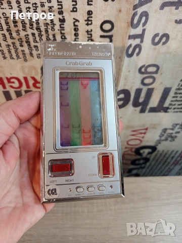 Портативна ретро конзола"Nintendo"Grab Grab.(1984г), снимка 3 - Антикварни и старинни предмети - 52649781