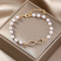 Нежни обеци с перли и гривна, снимка 1 - Бижутерийни комплекти - 44776357