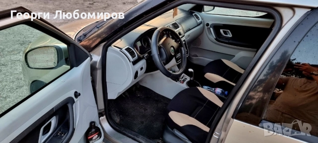 Skoda Roomster TDi, снимка 9 - Автомобили и джипове - 52892237