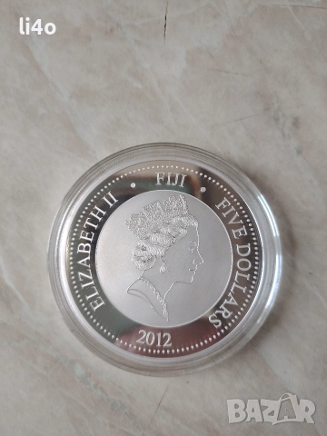 Инвестиционни монети Сребърна монета с частично позлатяване 24 карата златно покритие 2 тройунции 