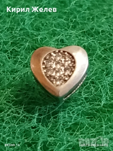 Сребърна обеца във формата на сърце с кристали 24490