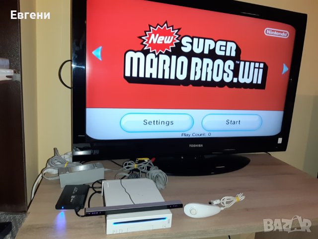Нинтендо Nintendo Wii комплект цената е за всичко 89 игри на хард диск