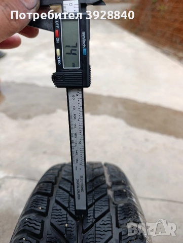 Зимни гуми с джанти 185/65R14 4x100, снимка 2 - Гуми и джанти - 52675814