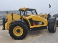 Телескопичен товарач Caterpillar TH407C, снимка 1