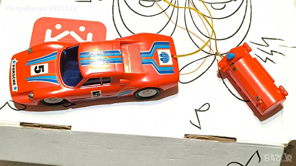 80s with this vintage plastic Porsche 904 GTS remote-controlled toy car, made in Singapore, снимка 1