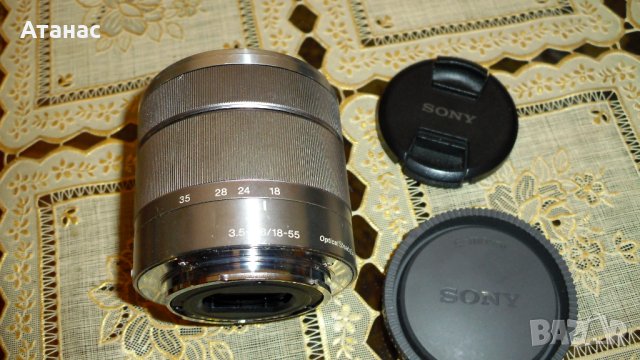 Обектив SONY E 18-55 OSS 3.5-5.6 за NEX, снимка 2 - Обективи и филтри - 44432060