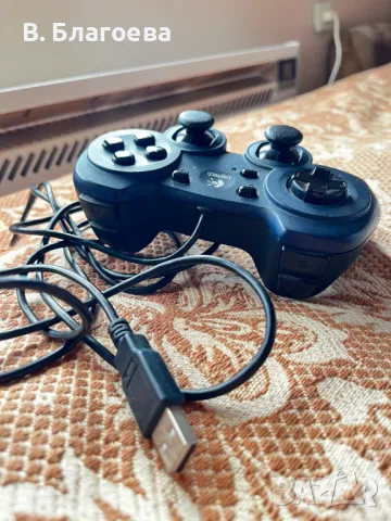 Logitech controller Dual Action, снимка 2 - Джойстици и геймпадове - 47580800