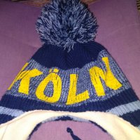 Зимна шапка с пискюл и вързанки на Кьолн, снимка 2 - Футбол - 39097529