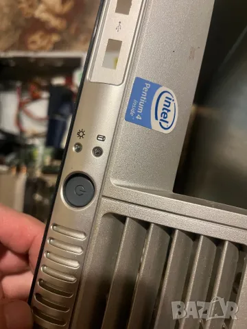 На части HP Compact 