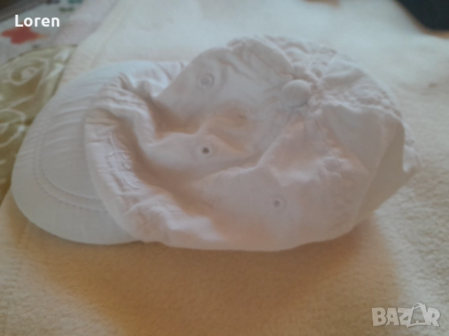 Бяла детска шапка , снимка 2 - Шапки, шалове и ръкавици - 51590086