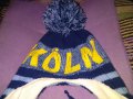 Зимна шапка с пискюл и вързанки на Кьолн, снимка 2