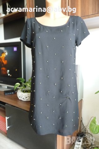 Черна рокля в свободен силует