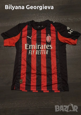 Puma AC Milan 2025/26 home jersey in red and black colors. 