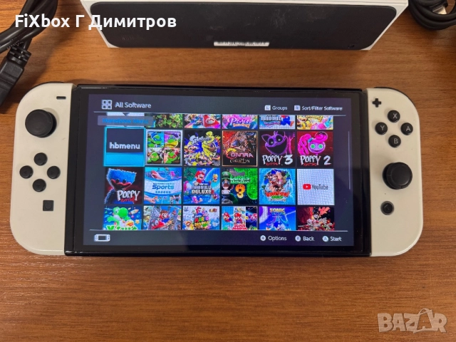 Хакнат Nintendo Switch Oled +128gb  Kefir Atmosphere с много игри , снимка 2 - Игри за Nintendo - 51631355