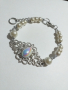 Красива гривна във Викториански стил с кристални перли и красиви орнаменти в цвят Сребро , снимка 1 - Гривни - 36259578