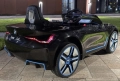 Акумулаторна кола BMW I4 12V с отварящи се врати меки гуми и кожена седалка, снимка 3