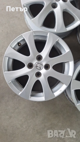 ОРИГИНАЛНИ АЛУМИНИЕВИ ДЖАНТИ ЗА МАЗДА -4Х100Х54-15цола, снимка 5 - Гуми и джанти - 53632405