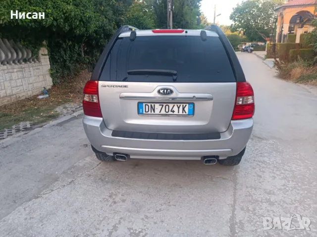 Kia Sportage 2.0 CRDI, снимка 4 - Автомобили и джипове - 47957676