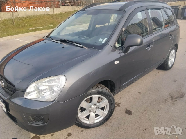 Продавам Киа Каренс 2,0 бензин/газ 144к.с.  2009г., снимка 10 - Автомобили и джипове - 53710882