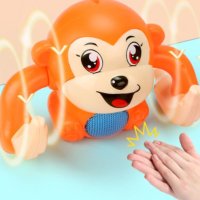 Бебешка играчка търкаляща се маймунка, дистанционно управление чрез пляскане, снимка 2 - Кукли - 42175548
