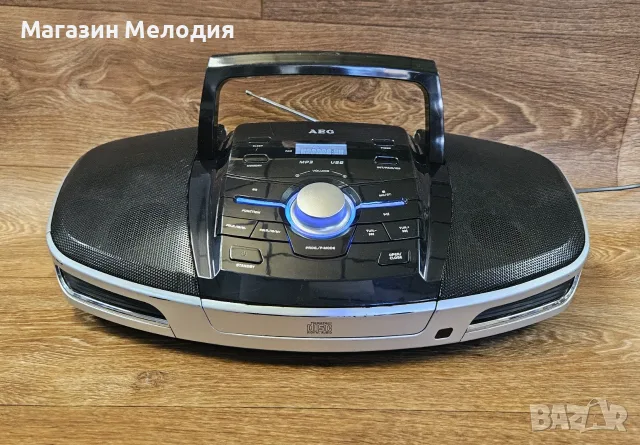 Портативна Bluetooth аудио система AEG SRP 4354 Има радио, Bluetooth, usb и диск.