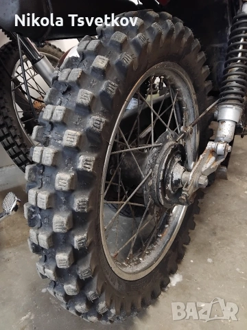 100/100-18 Michelin