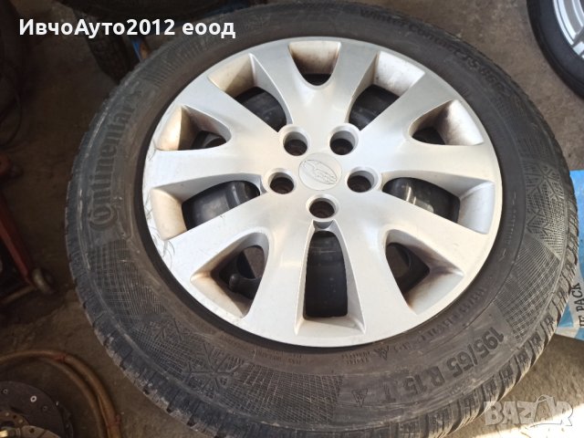 Комплект четири броя гуми с метални джанти и тасове оригинални 15 Subaru impresa