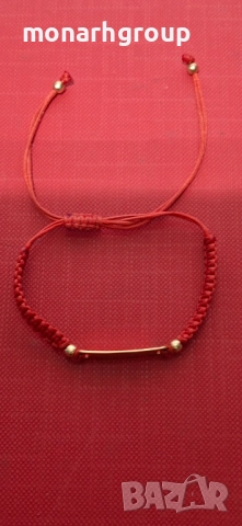 Златна гривна"тип конец" с надипис"Никол"