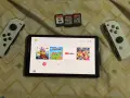 Nintendo Switch oled с 3 игри става и бартер, снимка 3