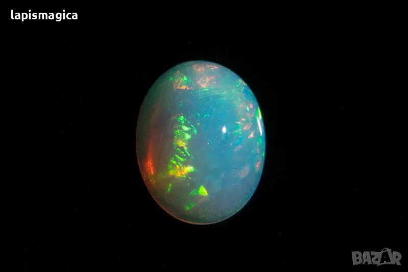 Етиопски опал 1.02ct овален кабошон, снимка 1