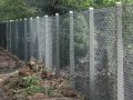 Изграждане на ограда с циментови колове и оградна мрежа, снимка 1