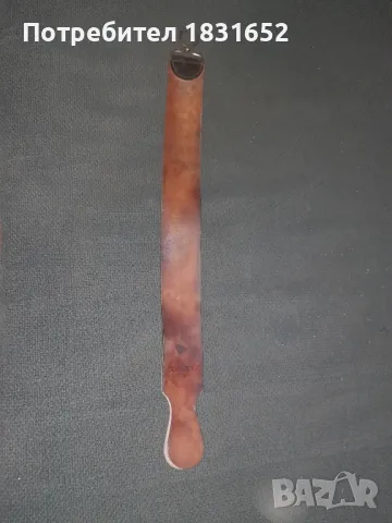 Стар бръснарски каиш