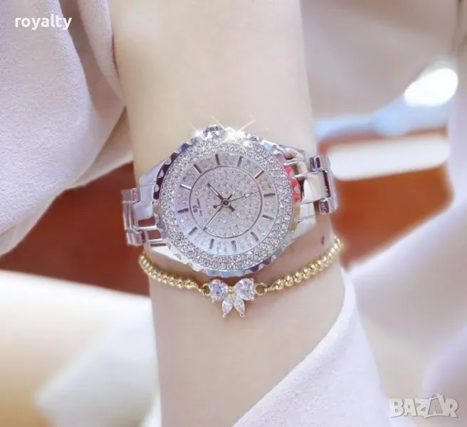 Уникален дамски часовник с циферблат, покрит с камъни, снимка 1