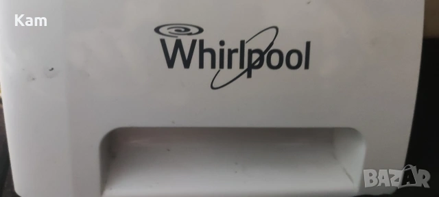 Пералня Whirlpool на части.