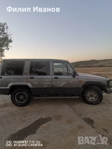 Isuzu trooper 2.6 бензин , снимка 2 - Автомобили и джипове - 56167636