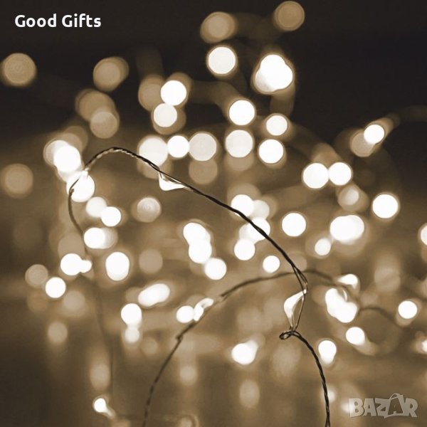 Коледни лампички в топло бяло, 200 LED диода, меден кабел, снимка 1