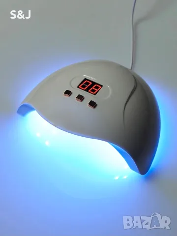 UV лампа за нокти, снимка 2 - Педикюр и маникюр - 56006622