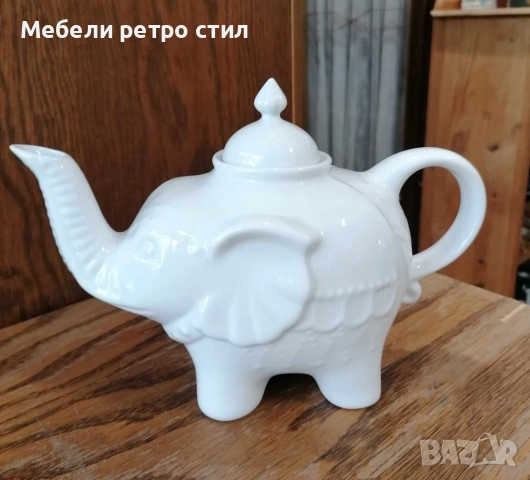 Чайник от бял порцелан, изработен във формата на щастливо слонче с вдигнат хобот и релефни детайли. , снимка 4 - Декорация за дома - 52007567