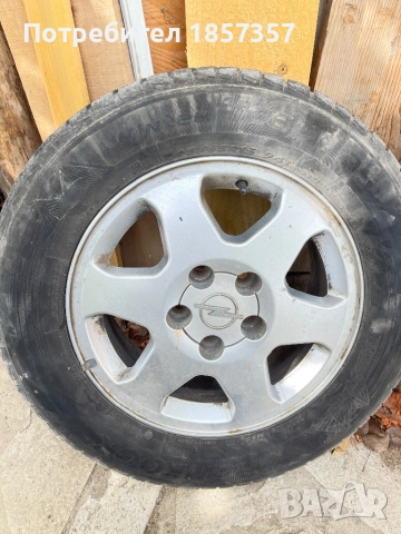 Зимни гуми с оригинални джанти Опел  15 205 65, снимка 11 - Гуми и джанти - 51857736