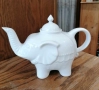 Чайник от бял порцелан, изработен във формата на щастливо слонче с вдигнат хобот и релефни детайли. , снимка 4