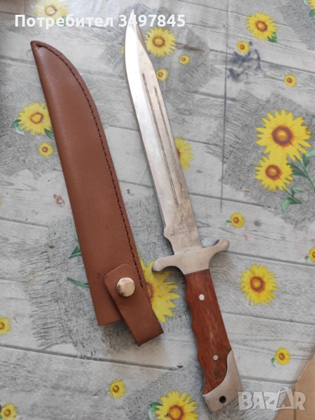 Нов нож неизползван но от стоене по метала на дръжката има точки ръжда, снимка 1