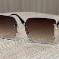 Слънчеви очила с кафеви стъкла и златна рамка, снимка 2 - Слънчеви и диоптрични очила - 44529878