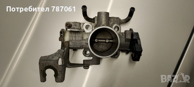 дроселова клапа .