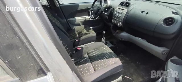 Daihatsu Sirion 1.3 - 91к.с. 2009г., снимка 13 - Автомобили и джипове - 55889154