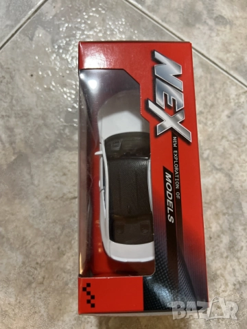Метална кола BMW M4 Welly NEX Models – бяла, нова в кутия, снимка 2 - Коли, камиони, мотори, писти - 56016025