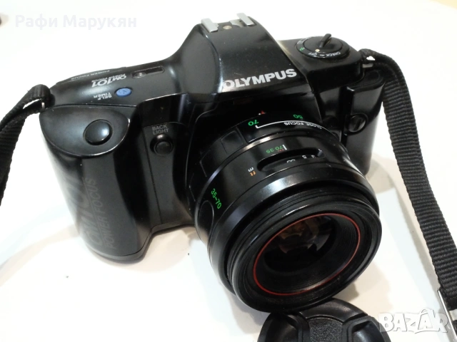 Филмовият "OLYMPUS OM-101" с об. "Zuiko 3,5-4,5/35-70 mm
