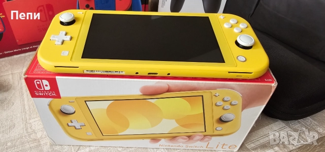 Nintendo Switch Lite Yellow 32 GB + 128GB карта, снимка 6 - Nintendo конзоли - 52986976