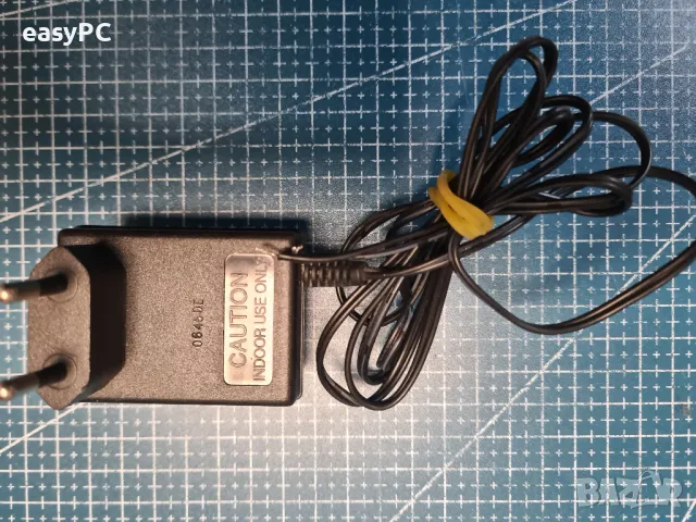 Оригинален захранващ адаптер TL9300D-4 9V 300mA, снимка 2 - Друга електроника - 48441870